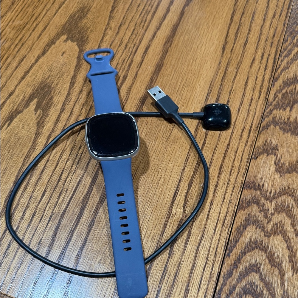 Fitbit versa 2 with Blue Band and Black Face